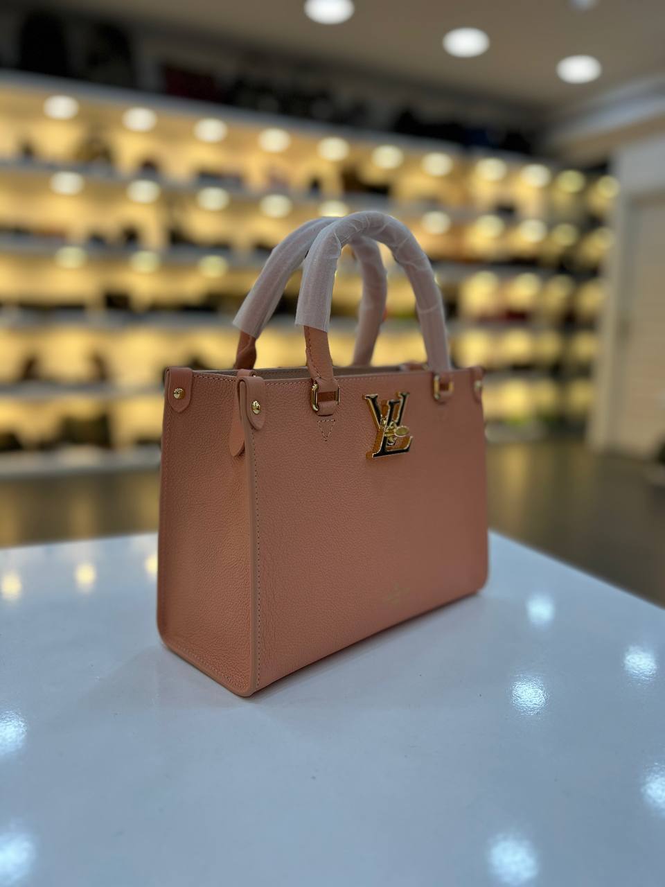 LOUIS VUITTON LOCK GO