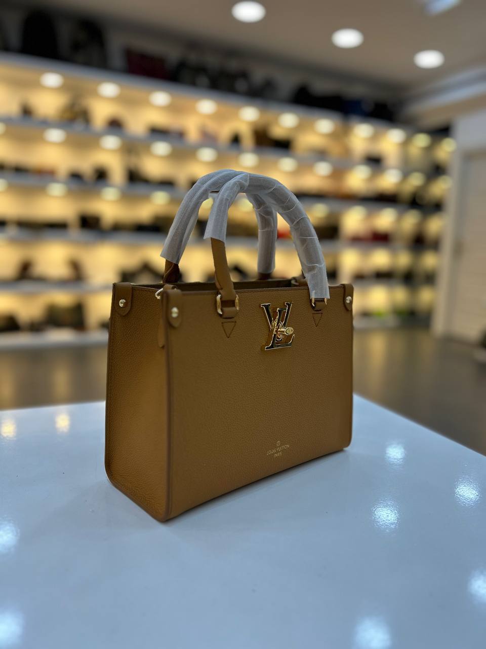 LOUIS VUITTON LOCK GO