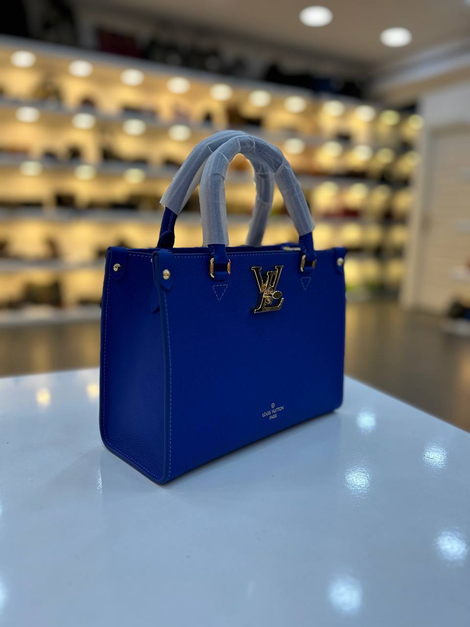 LOUIS VUITTON LOCK GO