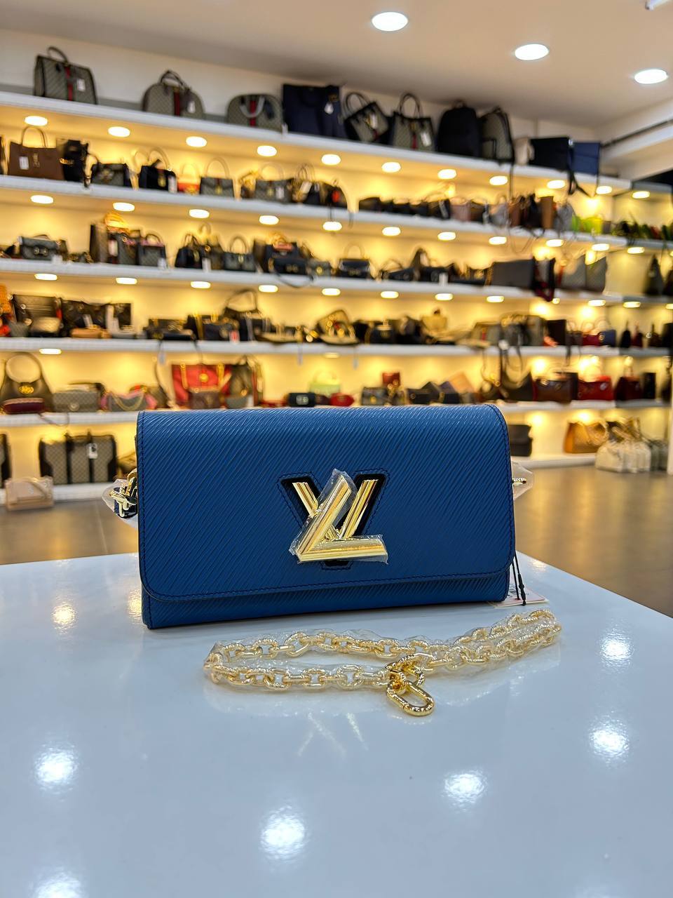 LOUIS VUITTON TWIST CLUTCH