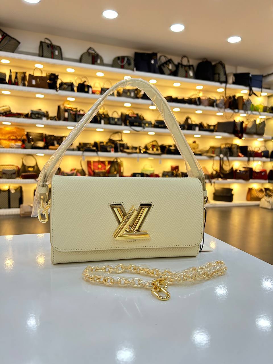 LOUIS VUITTON TWIST CLUTCH