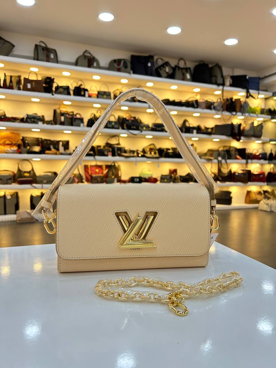 LOUIS VUITTON TWIST CLUTCH