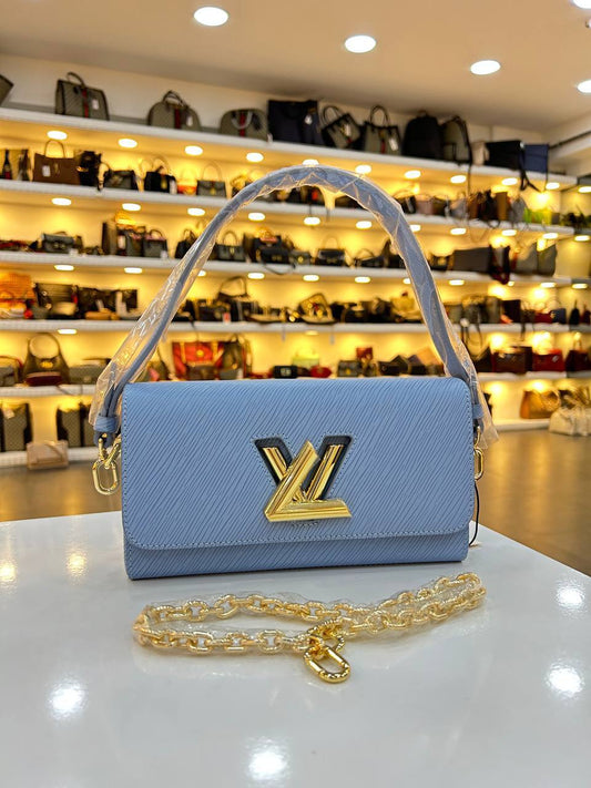 LOUIS VUITTON TWIST CLUTCH