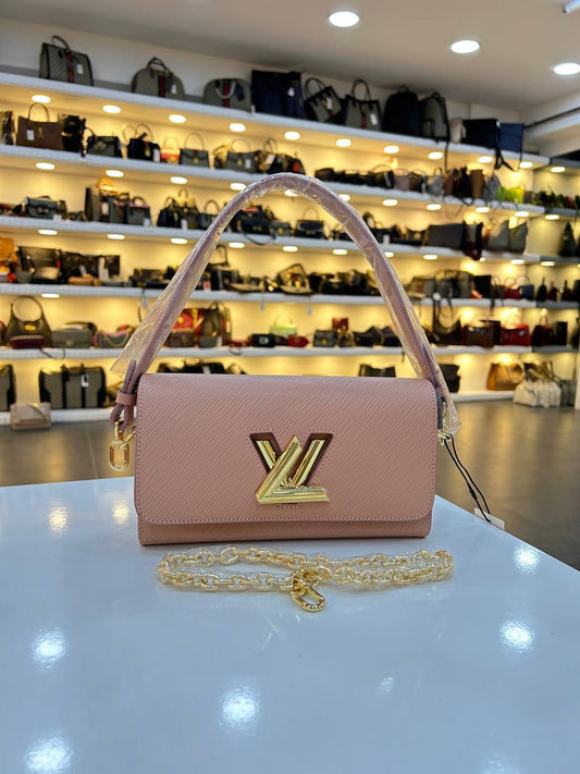 LOUIS VUITTON TWIST CLUTCH